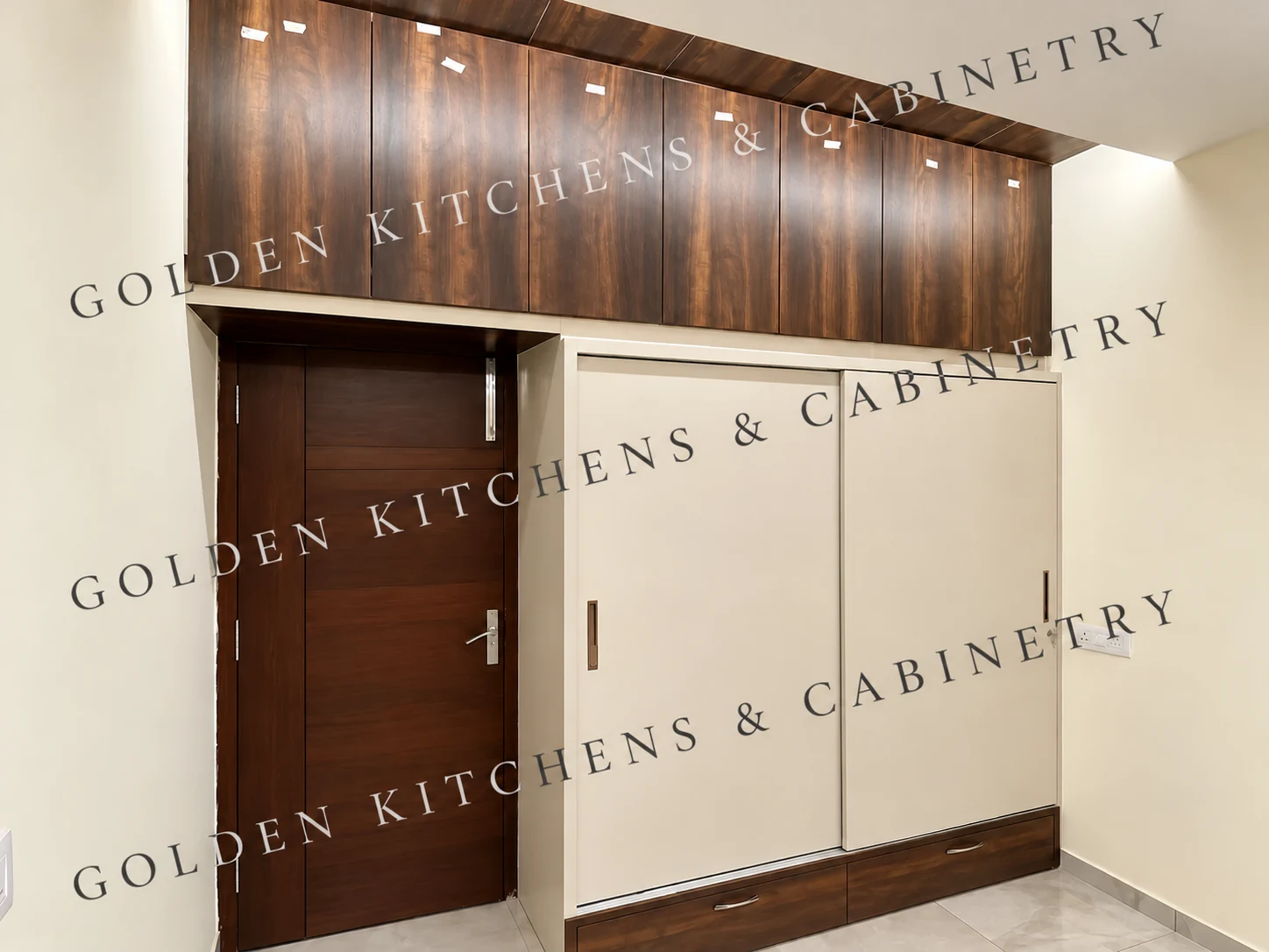 Cream sliding wardrobe with woodgrain overhead cabinetry