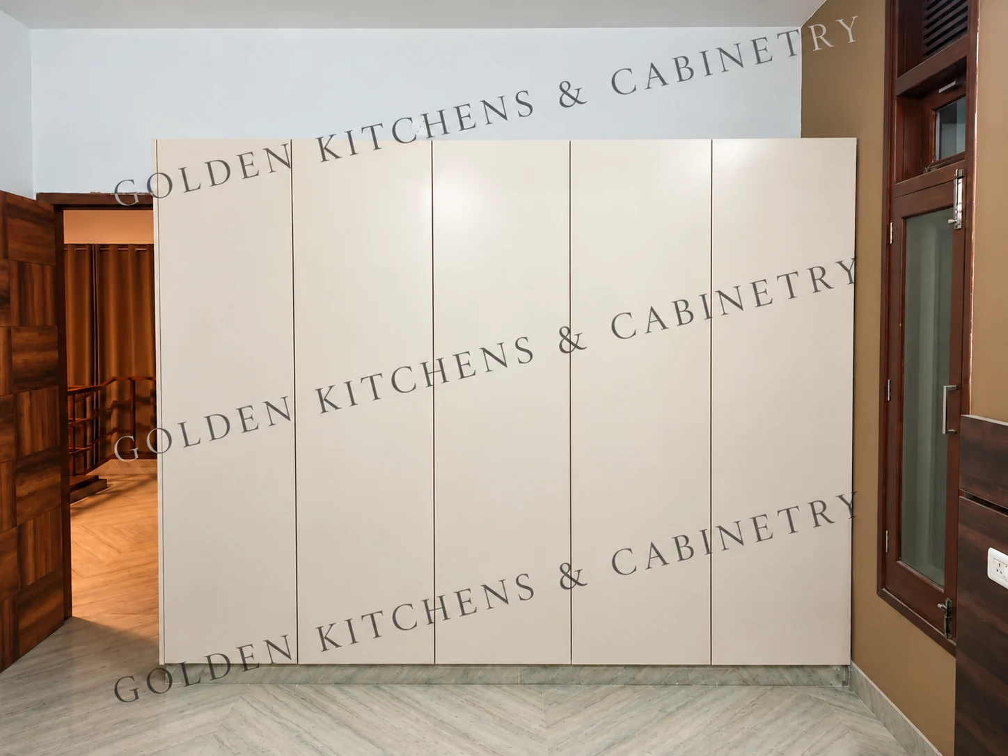 Cream four-door wardrobe